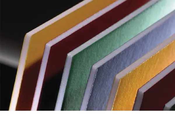 Stacked coloured matboards — sheet stock warehoused and distributed by Rafi Group in Dubai